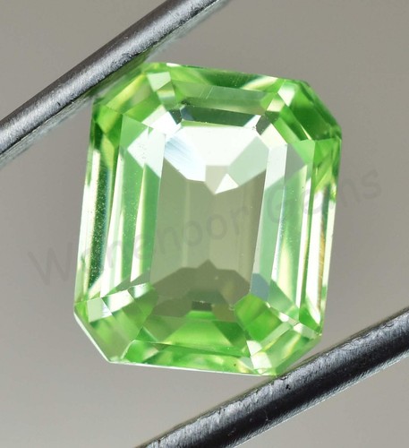 7.90 Ct Natural Green Peridot Emerald Shape VVS Pak Gemstone AGL Certified - Picture 4 of 5