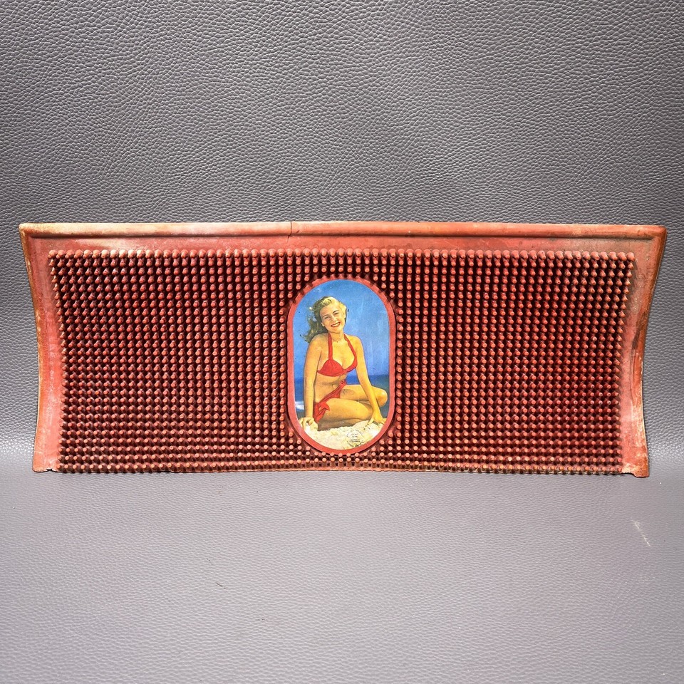 A genuine 1953 pinup bar runner from Mitchell Rubber Co. — actual mid-century man-cave art you can use, not just hang on a wall.