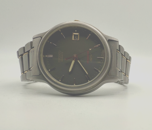 Vintage (2005) Seiko SQ50 35mm Titanium Cal. 7N42 Unisex 5 ATM Classic Watch - Picture 4 of 7