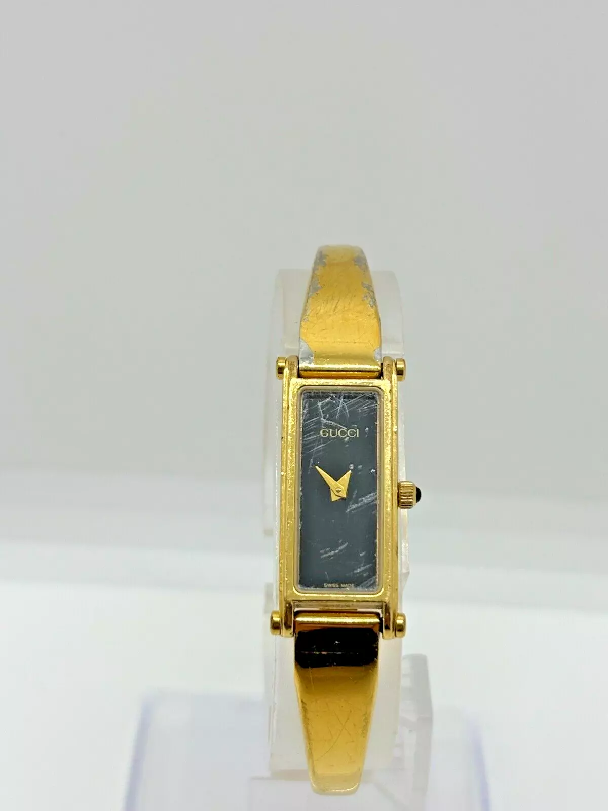[Lire] Montre GUCCI 1500 Cadran Or Noir QZ Bracelet Femme Occasion Fonctionne