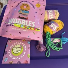 The Woobles FILLED Mystery Donut Learn crochet kit Yellow Purple Green Blue Tan