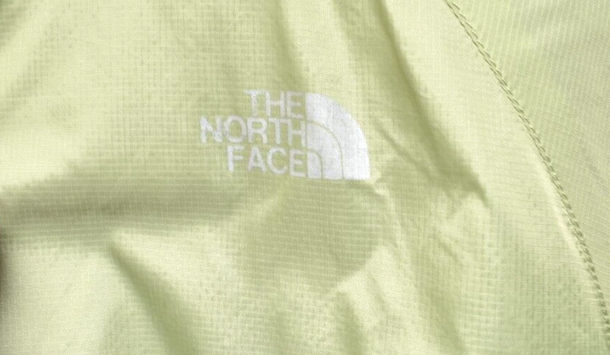 north-face stow pocket rain windbreaker jacket