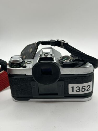 Canon AE-1 Program fotocamera reflex pellicola nero e argento 35 mm manuale esposizione automatica - Foto 17 di 17