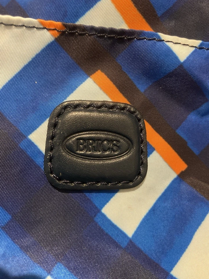 Bolsa de viagem dobrável Bric’s X-Travel laranja e azul, alças e etiquetas de couro - Imagem 3 de 4