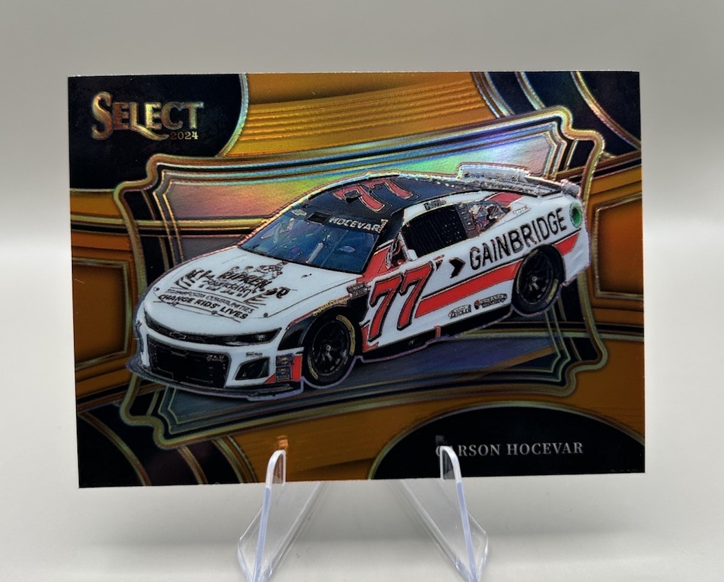  2024 Panini Select NASCAR #136 Carson Hocevar Pit Road TRUE ORANGE Prizm SP /49