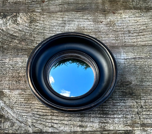 Miroir style Napoléon III noir patiné avec oeil de sorcière Diamètre 19 cm