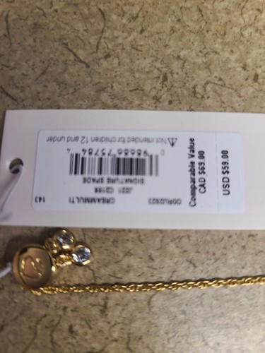 Kate Spade Goldtone Signature Spade Slider Bracelet - Picture 3 of 3