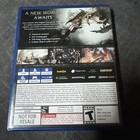 Monster Hunter: World PS4 case with back cover art, yellow dragon silhouette, and Capcom logos.