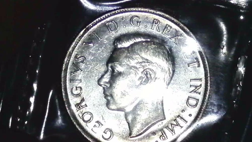 1945 Canada Silver Dollar ICCS MS60.  5/5 not on slab but clear as day.