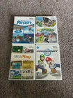Lot Of 4 Wii Games! Wii sports Resort , Wii Deca Sports, Mario Kart Wii, wii pla