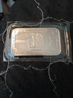 one troy oz. in god we trust with eagle .999 silver bar