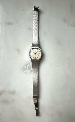 Milus Mid Century Damenuhr silberfarben