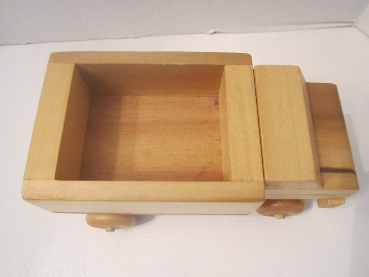 Hand crafted wooden toy truck by C. J. Maginley. 5.5