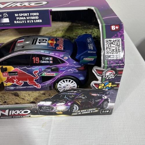 Telecomando Nikko M-Sport Ford Puma Hybrid Rally 1 #19 LOEB Red Bull 1:18 - Foto 5 di 12