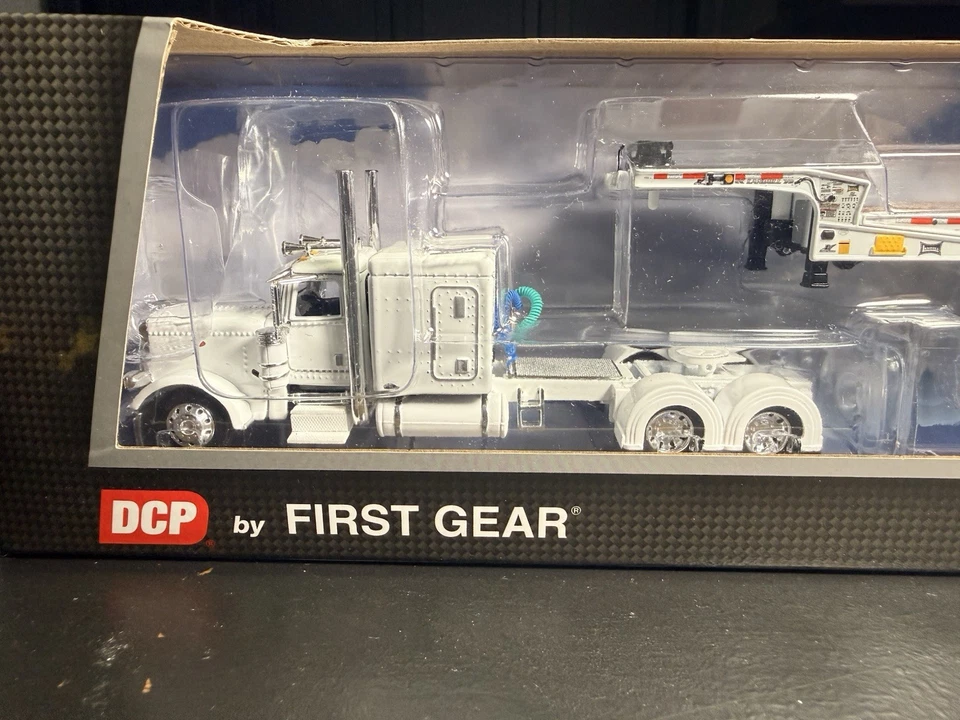 1/64 DCP white Peterbilt 389  with white Landoll slide axle flatbed trailer - Image 2 of 4