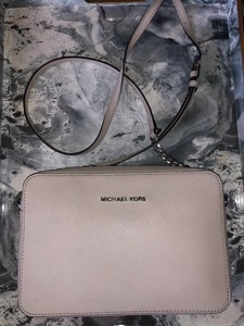 jet set east west crossgrain leather crossbody