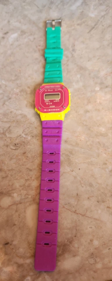 Genial reloj digital vintage G-Shock Le World W-24 200M verde púrpura rojo y amarillo Foto 4 de 4