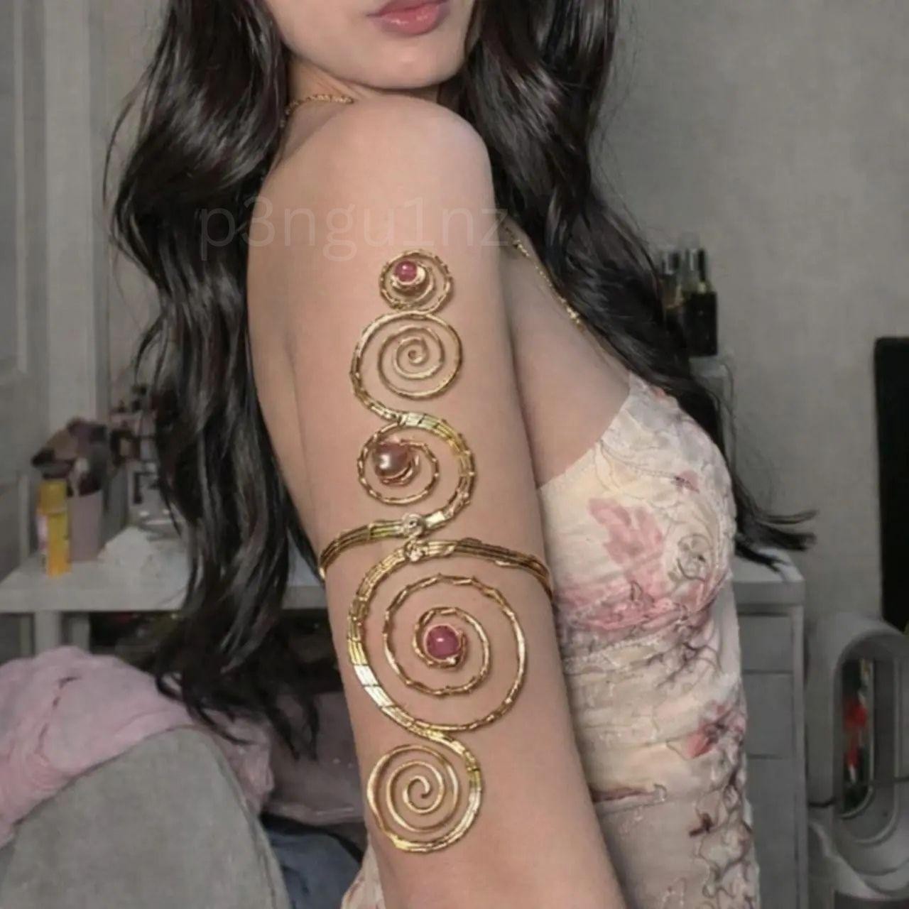 Handmade gold spiral arm cuff