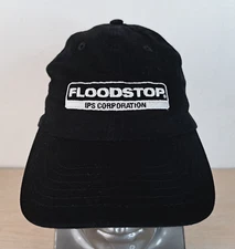 FLOODSTOP  IPS CORPORATION ADJUSTABLE STRAPBACK BASEBALL HAT/CAP, BLACK, DAMAGE