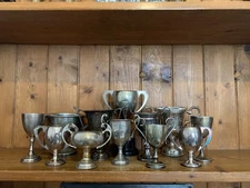 Damaged x 12 vintage silver plate trophies, loving cup