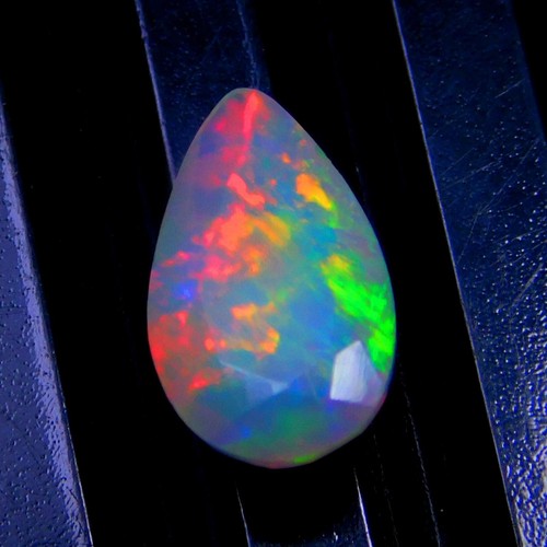 AAA White Base Faceted Ethiopian Opal Loose Gemstone Size 11.3x6.7x3.6mm 1.2cts - Picture 2 of 3