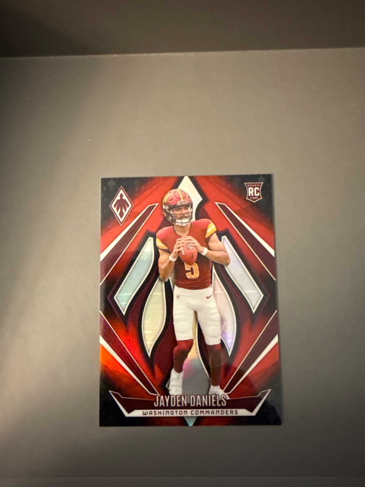 2024 Panini Phoenix #198 Jayden Daniels Red Fade Rookie /299 Commanders RC