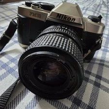 UNTESTED! Nikon FM10 35mm SLR Film Camera 28-70 mm  SPECTRUM lens Kit