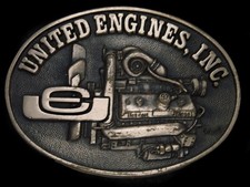 TH11165 VINTAGE 1980s  UNITED ENGINES, INC.  ADVERTISEMENT SOLID BRASS BUCKLE