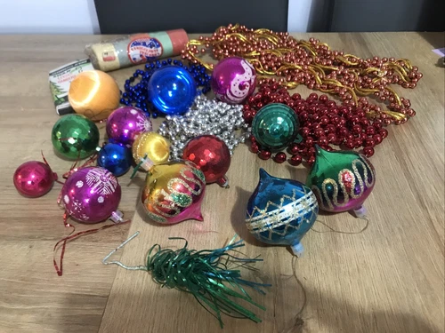 A Selection Of Vintage Colourful Christmas Tree Baubles Candles garlands