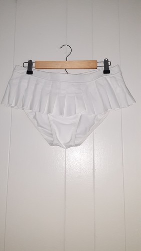 two piece women's bathing suit, white, pleated, skirt style bottom, flower top - Picture 4 of 4