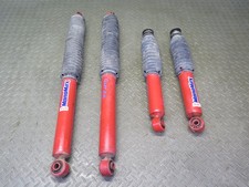 2003-2007 HUMMER H2 AWD KYB MONOMAX FRONT & REAR STRUT SHOCK ABSORBER SET OF 4