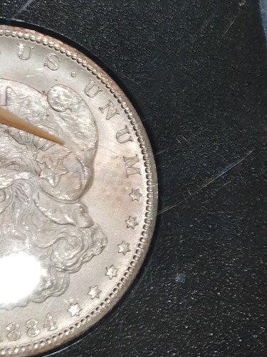 Rare 1884 Carson City Uncirculated Silver Dollar with toning - Picture 9 of 11
