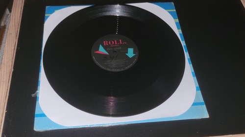 Paul Lewis    Around The World   12"  Vinyl     1986 ROLL Records VG - Foto 1 di 3