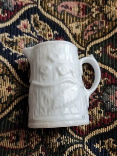 small vintage porcelain pitchers