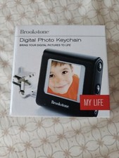 Brand new Brookstone My Life Digital Photo Keychain Holds 100 Pictures