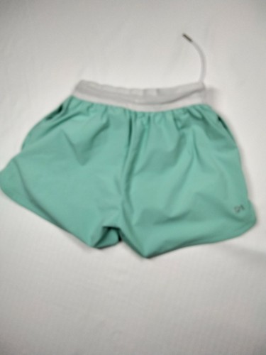 Girls ASICS Light Green Running Shorts Size Extra Small RN# 66200 EUC Nice! - Picture 2 of 3