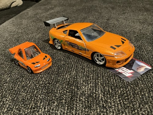 Jada Fast & Furious Pull And Go Toyota Supra escala 1/32 y Hot Wheels Supra - Imagen 2 de 12