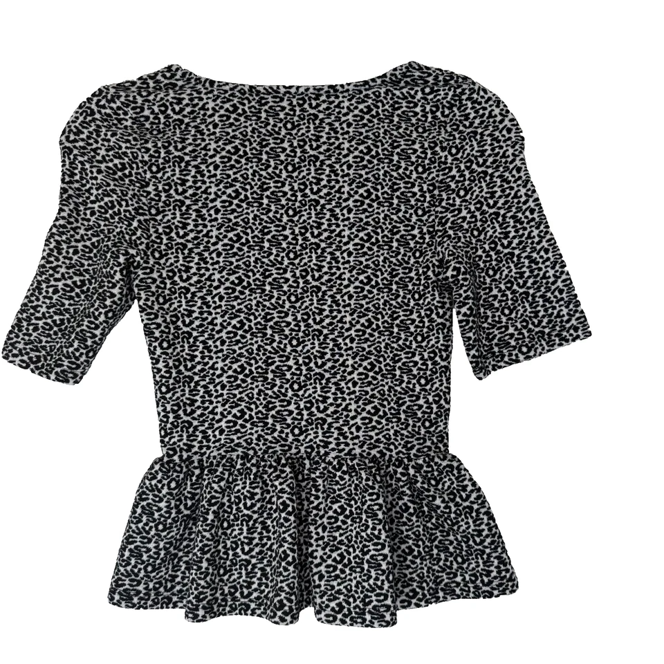 Blusa Maeve by Anthropologie Peplum Top XS Negro Blanco Estampado Animal Tejido Elástico Foto 2 de 4