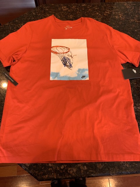 white red and blue nike shirt
