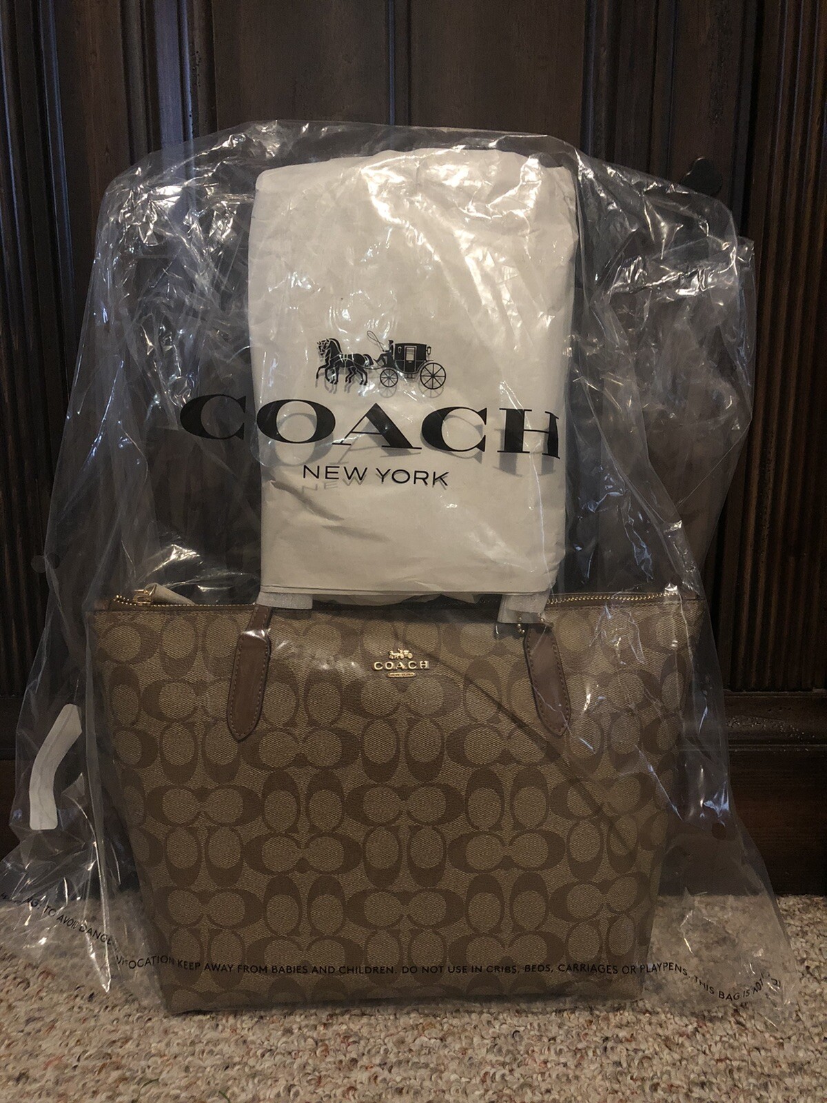 Coach Zip top tote bag in Signature canvas. Gold/khaki/saddle. Style 4455. New.