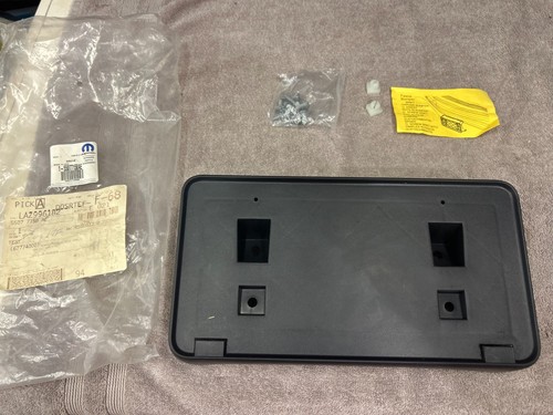 2002 - 2010 DODGE RAM 1500 - 5500 FRONT LICENSE PLATE BRACKET 55077158ae OEM NOS