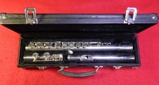 silver virtuoso flute with Hard Case.