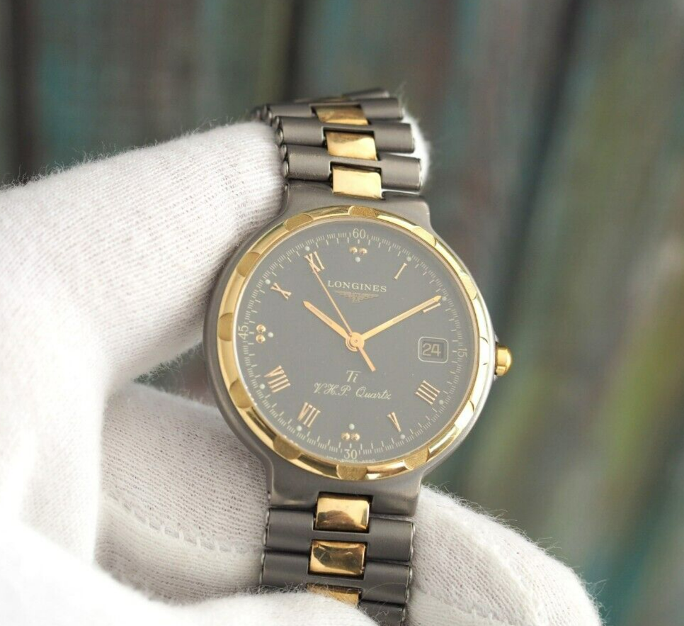 Longines Conquest Titanium/14k .585 yellow gold ref.24590224 Longines Conquest Titanium/14k .585 yellow gold ref.24590224