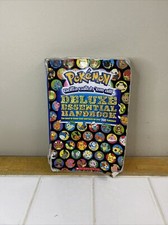 Pokémon Deluxe Essential Handbook by Scholastic (2015, Trade Paperback, LP)