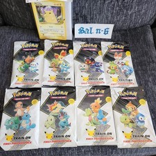 Complete Set (8) Pokémon First Partner Packs + Binder & Display Box