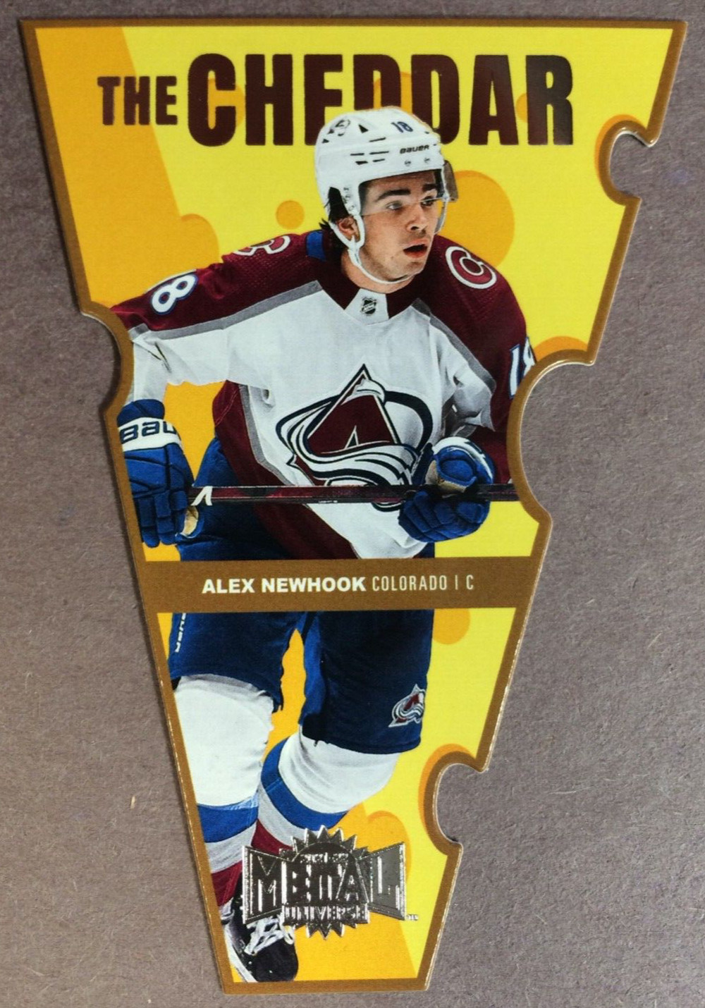 2021-22 SkyBox Metal Universe The Cheddar #TC-28 Alex Newhook Colorado Avalanche