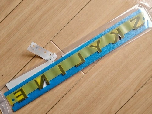 Nissan Genuine OEM 84895-JK000 Rear Emblem Badge Skyline Infiniti G37 V36 09-13 - Picture 3 of 7