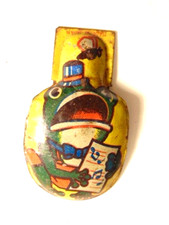 vintage tin clicker noise maker of singing frog; made in Japan
