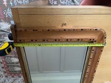antique inlaid wooden mirror, medium size, rectangular shape to mantle on wall.
