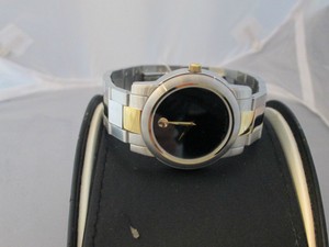 movado swiss made stainless steel water resistant sapphire crystal